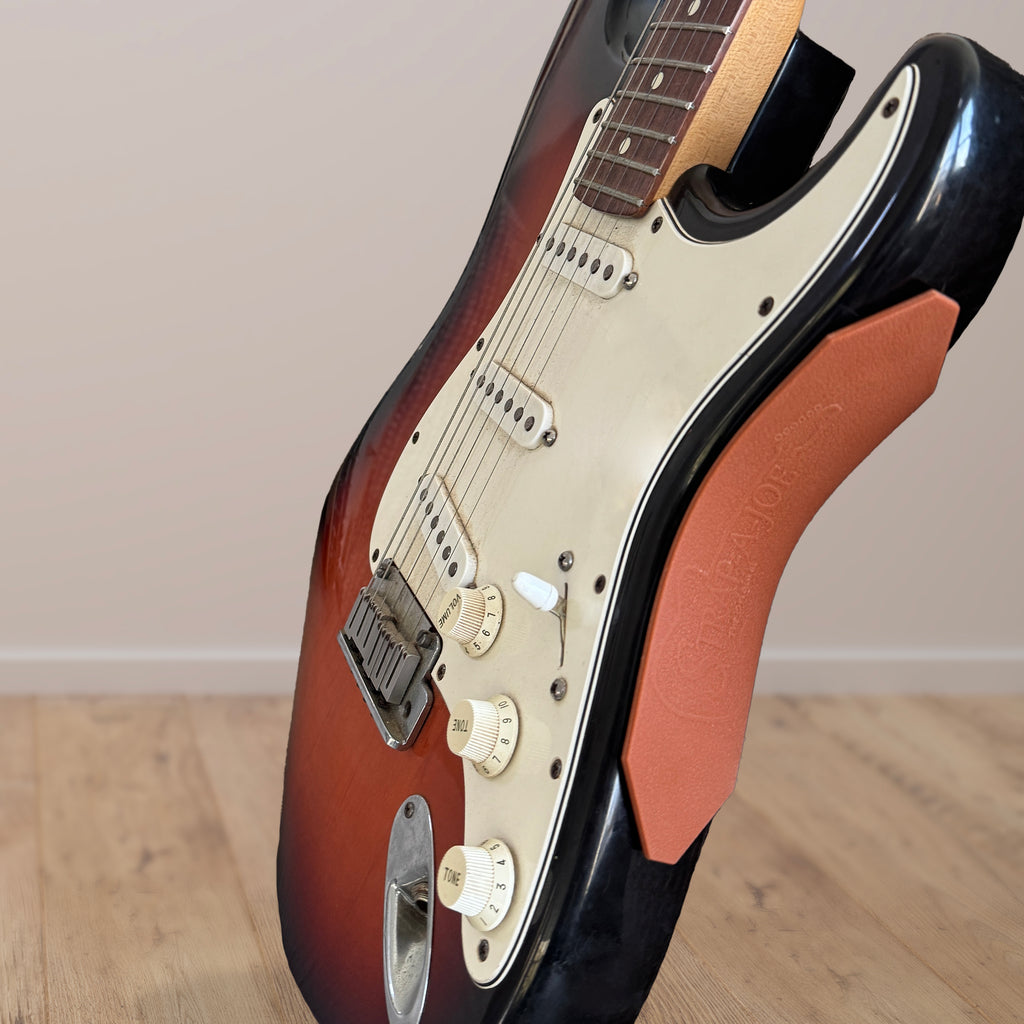 Strap-A-Joe guitar strap prevents guitar from sliding while seated

